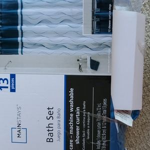 Teal shower curtain, waste basket